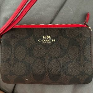New condition coach wristlet from clean smoke free home